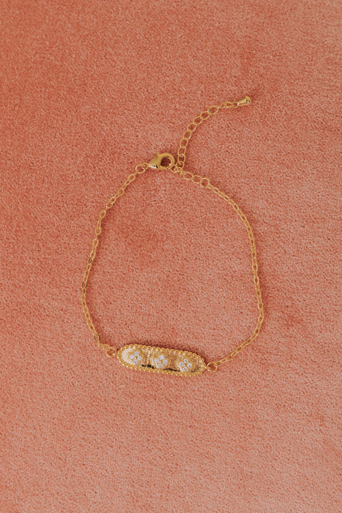 gold 3 rhinestone pendant bracelet flatlay