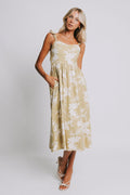 olive and white floral patterned midi dress