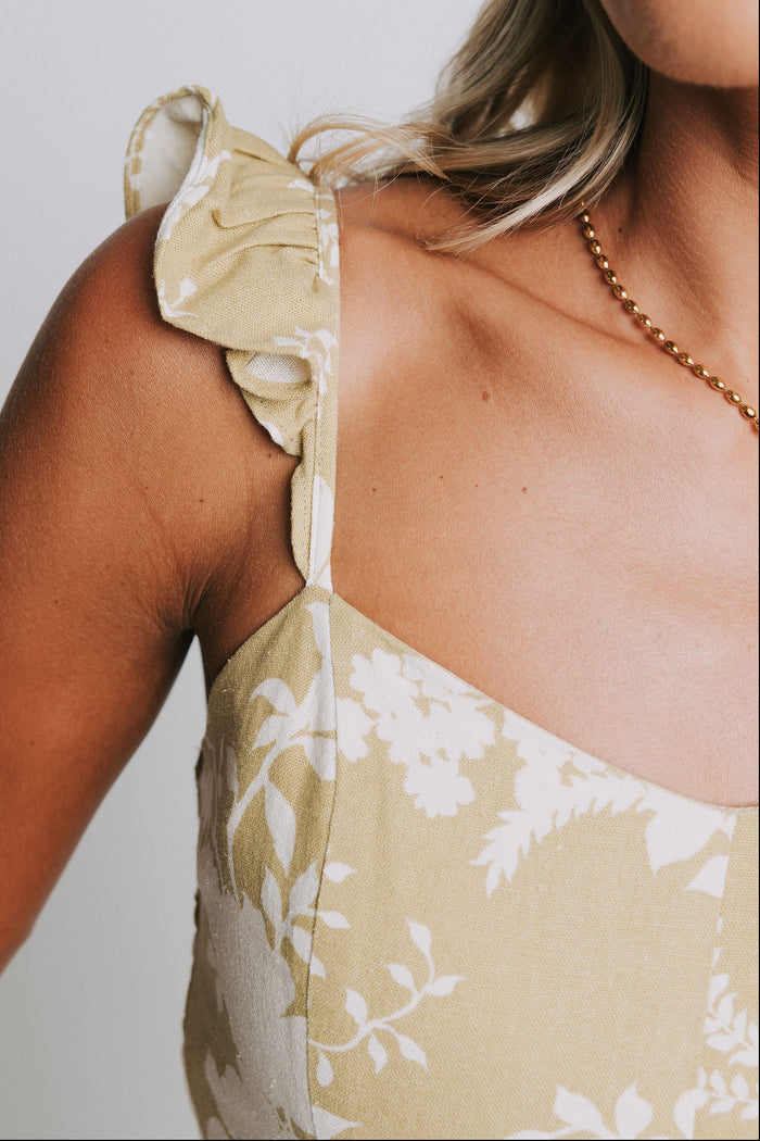 olive and white floral patterned midi dress sleeves