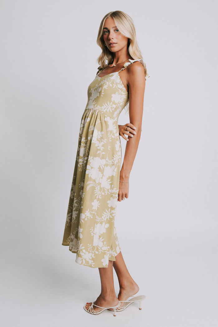 olive and white floral patterned midi dress side