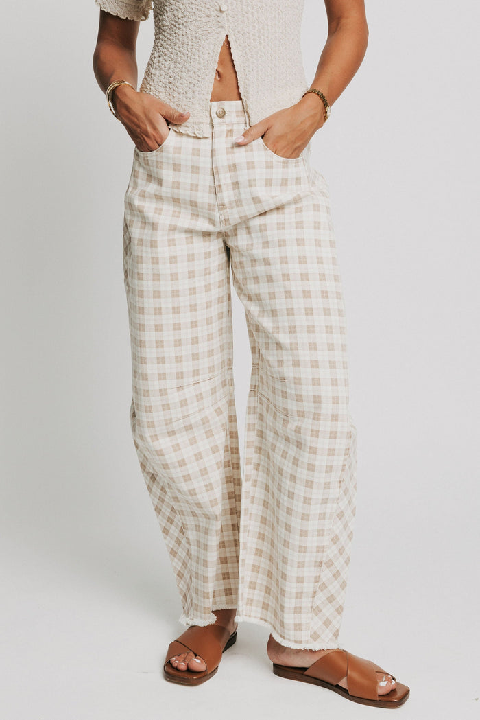 cream plaid barrel jeans with raw hem