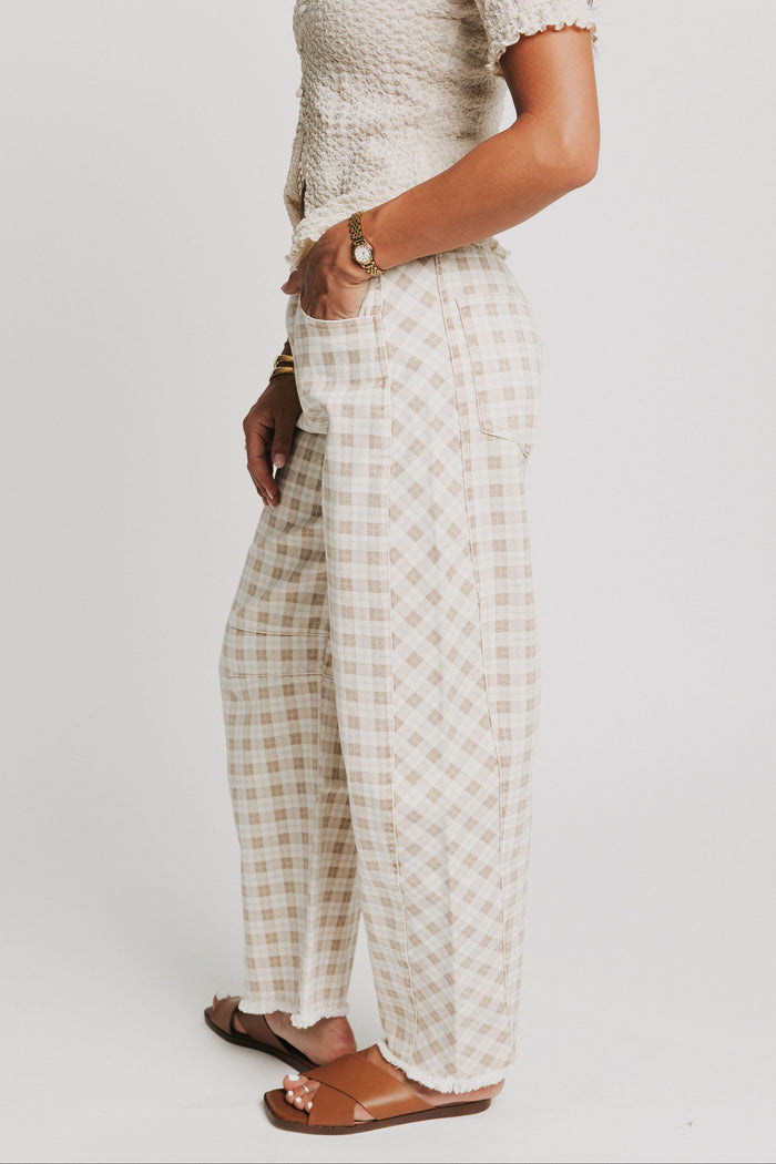 cream plaid barrel jeans with raw hem side