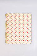 Notebook with heart pattern and cherries on a light gray background