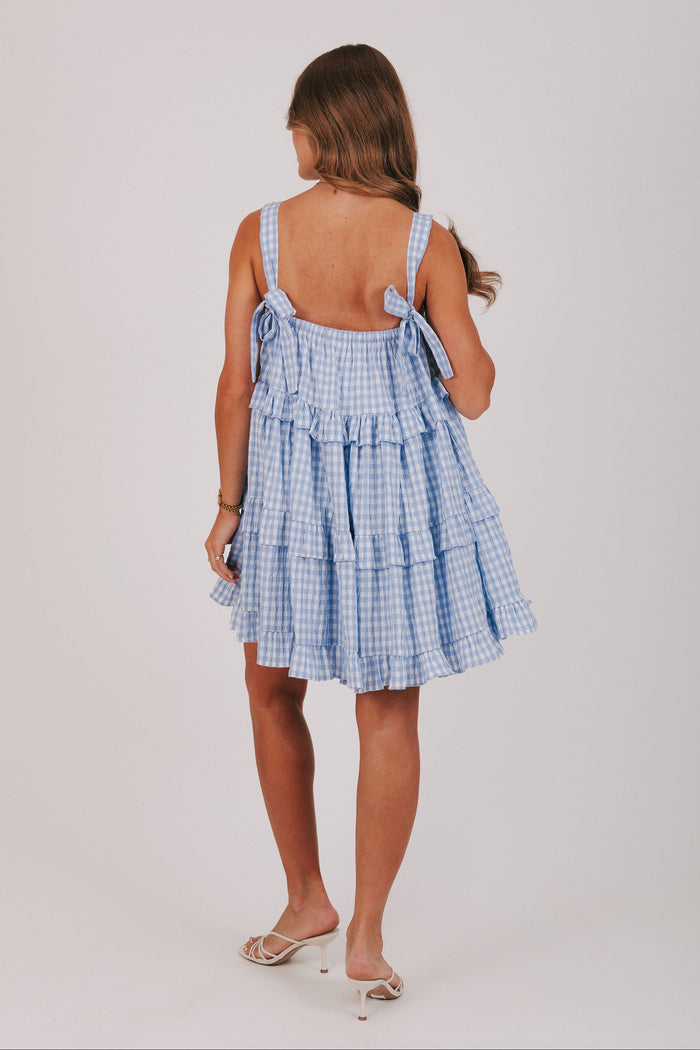 blue and white gingham tiered babydoll dress back