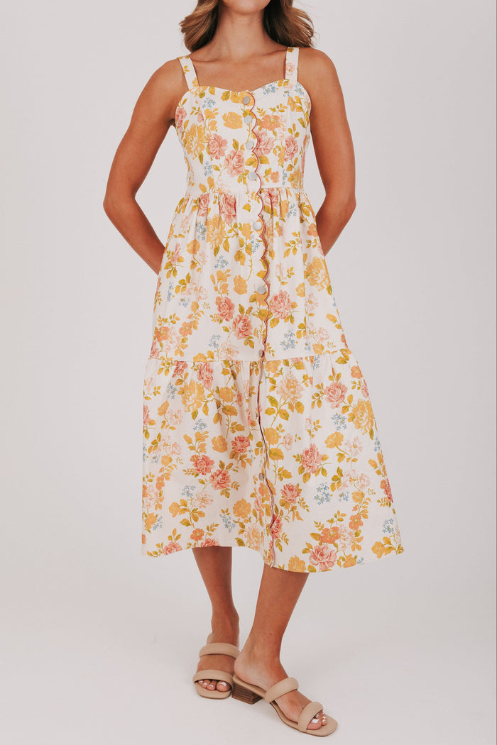 floral midi dress with scalloped buttons