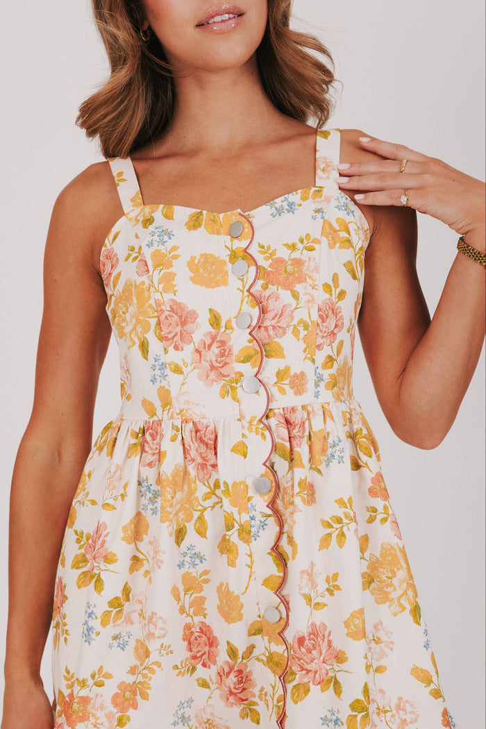floral midi dress with scalloped buttons front