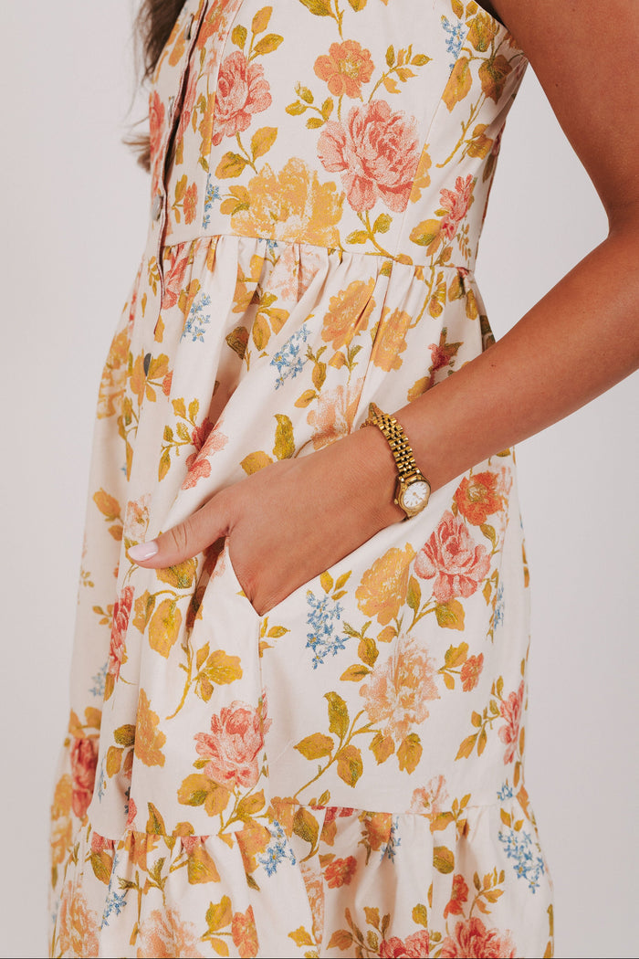 floral midi dress with scalloped buttons pockets