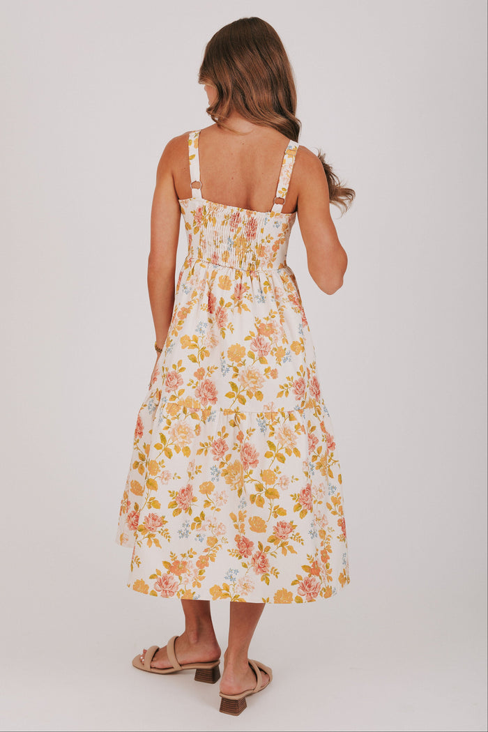 floral midi dress with scalloped buttons back