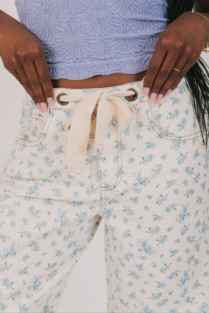 denim blue floral cream tie barrel jean front