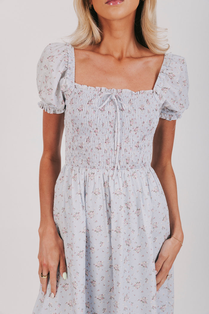 blue floral dress with puff sleeves