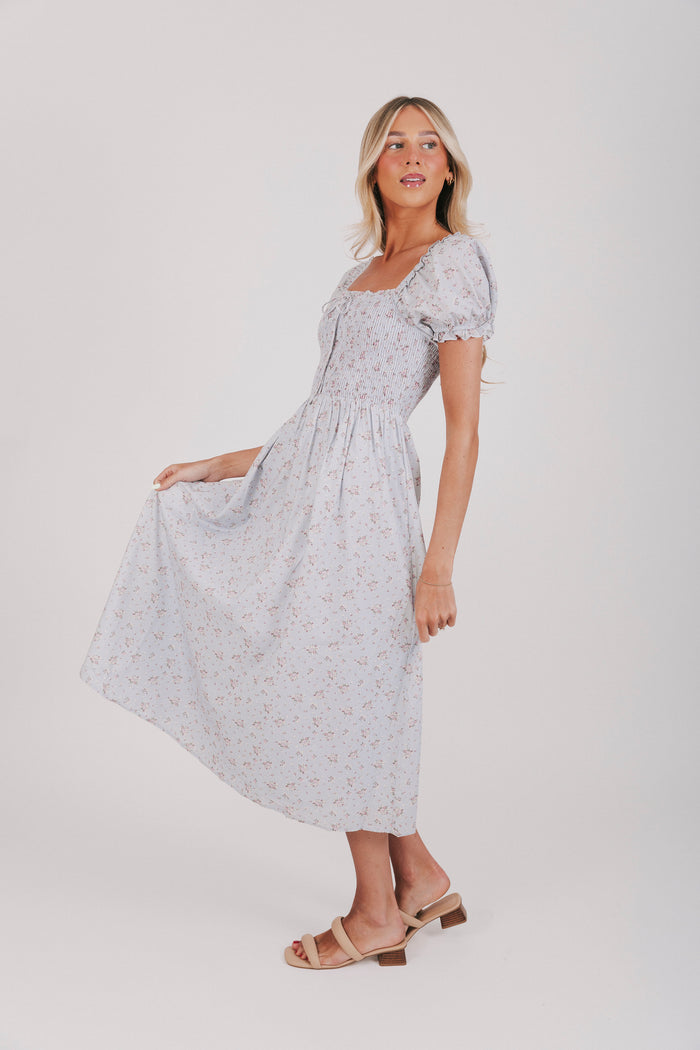 blue floral dress with puff sleeves