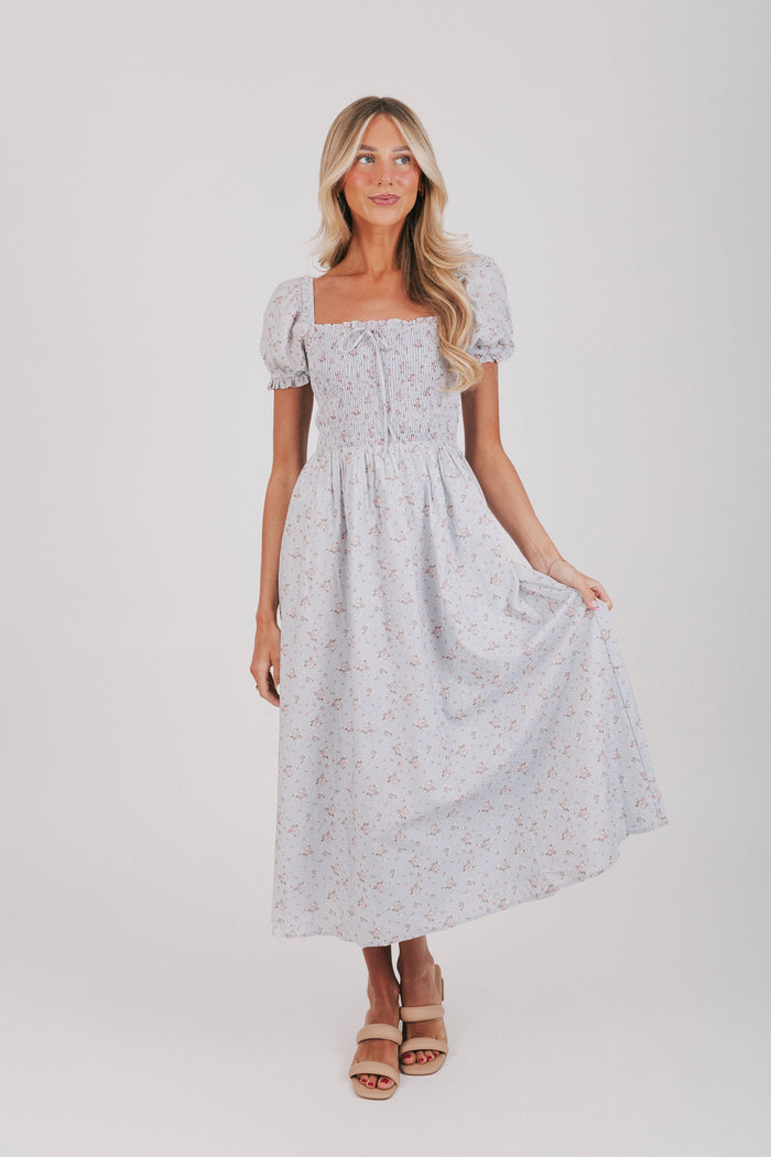 blue floral dress with puff sleeves