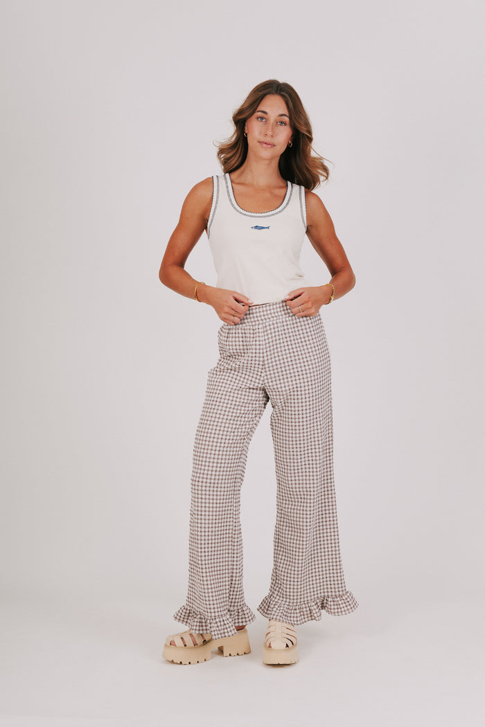 brown and white gingham pants with ruffled cuffs full