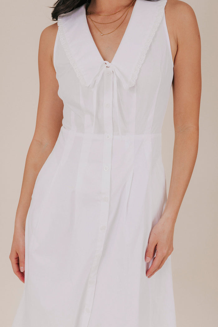 white pan collar pleated bow lined dress detail