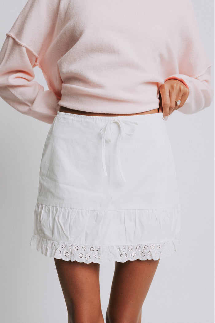 white mini skirt with eyelet lace trim