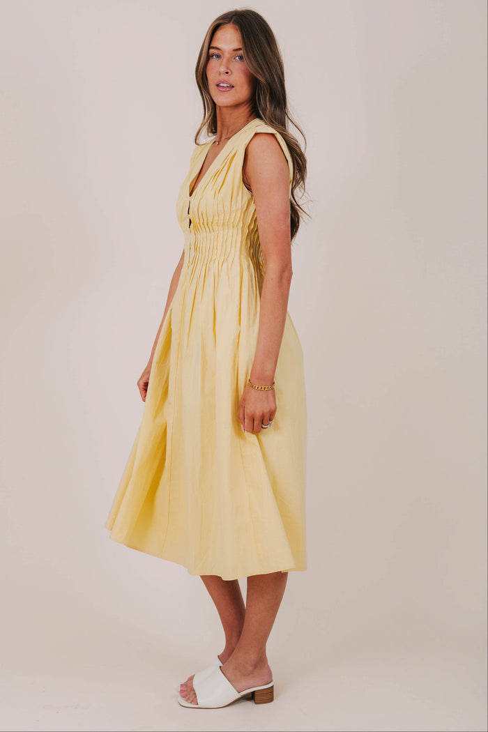 yellow pleated button down midi dress side