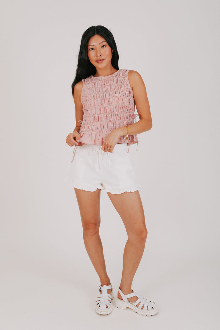 red smocked tank with bows on the side full