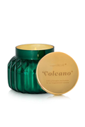 Faceted green candle jar with gold lid in scent Volcano by Capri Blue