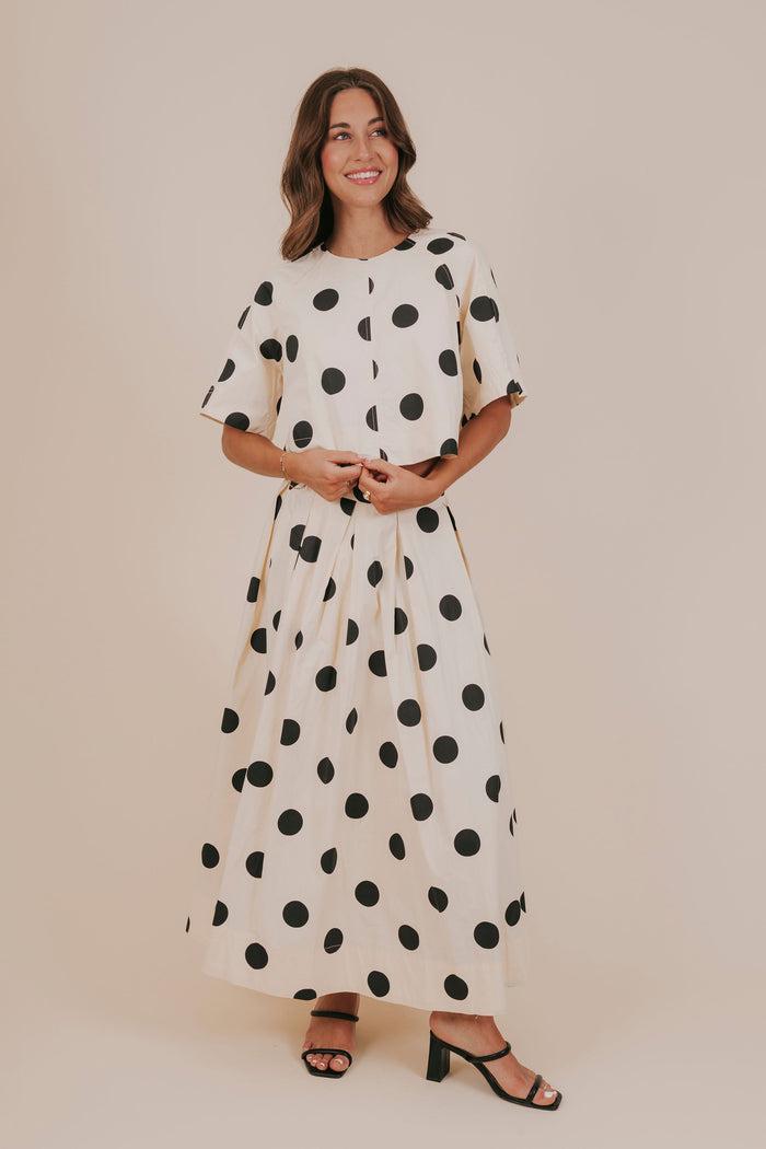 ivory black polka dots open back ties cropped top model
