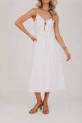 white midi dress with keyhole and bows on bodice
