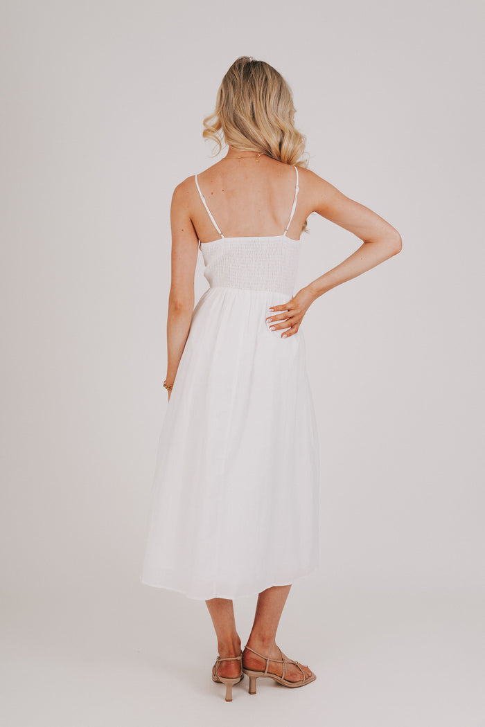 white midi dress with keyhole and bows on bodice back