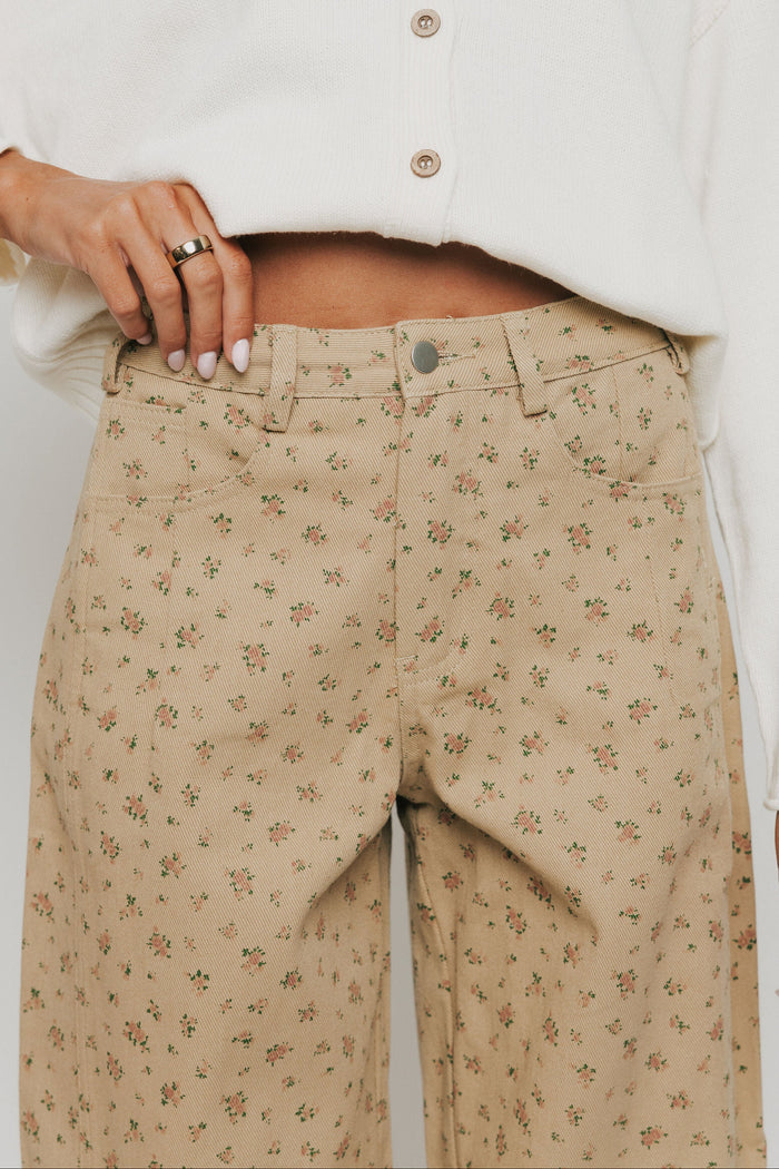 brown floral barrel jeans waistline
