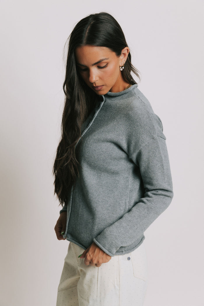 knit cardigan with rolled edges and buttons side