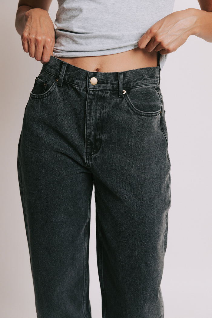 washed black straight leg jeans front