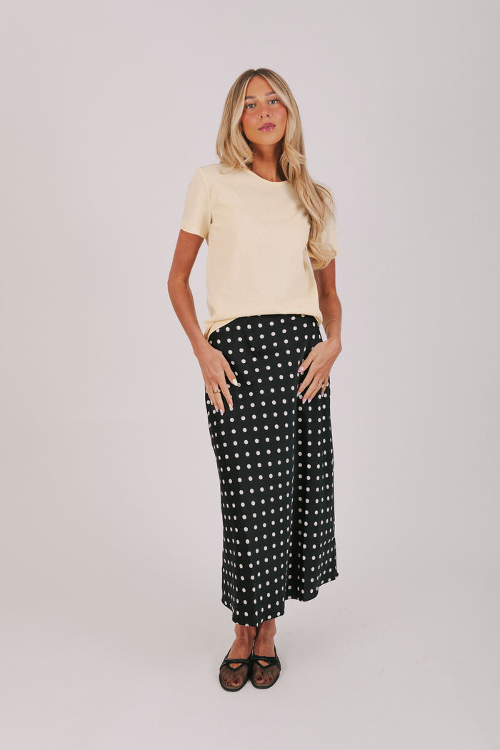 Satin maxi length skirt in black with white polka dots