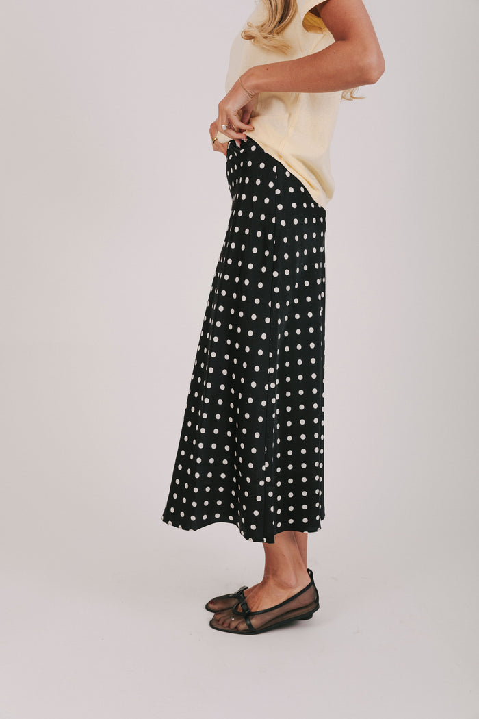 Satin maxi length skirt in black with white polka dots