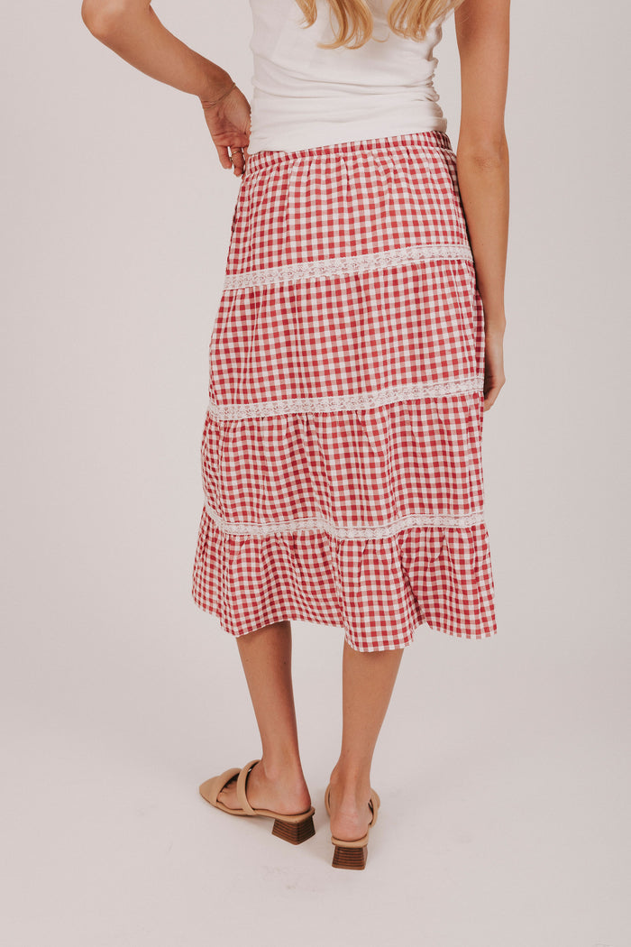 Red and white gingham midi skirt with lace trimmed tiers and a tied bow