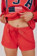 red sweat shorts with USA decal