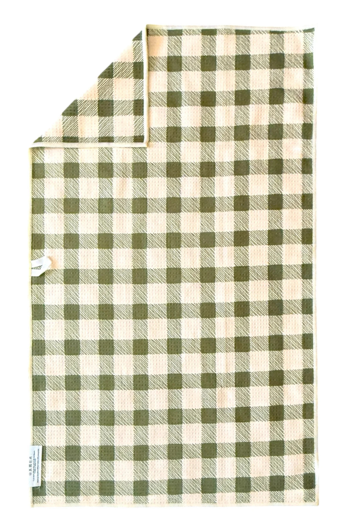 Green and beige plaid microfiber hand towel.