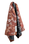 Reversible hand towel with floral pattern