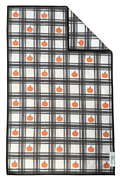 Plaid microfiber hand towel with orange pumpkins on a white background