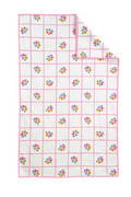 Floral patterned microfiber towel with pink border and a white background