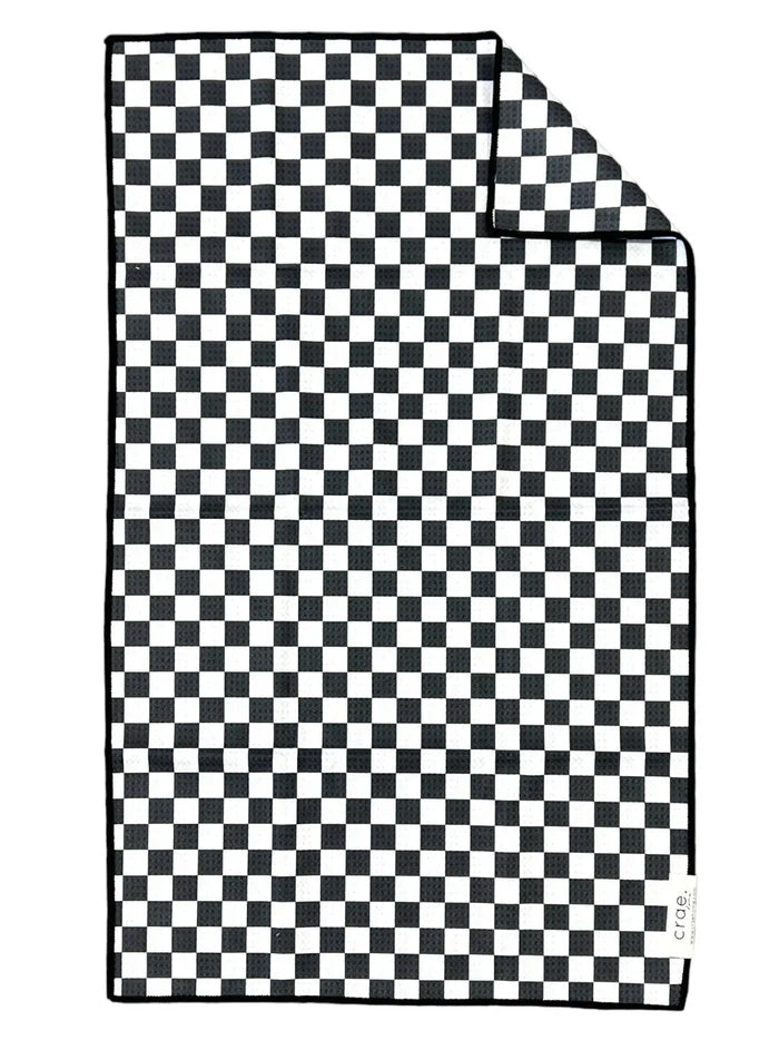 A black and white checkered double-sided hand towel made of microfiber