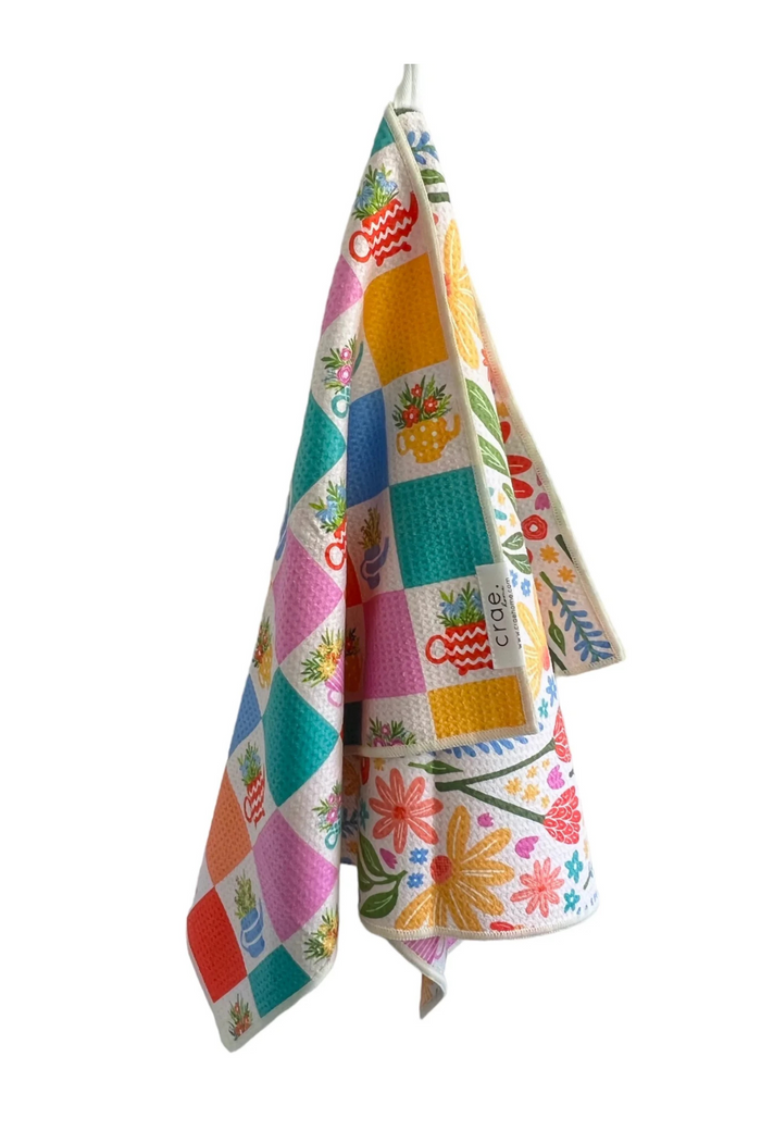 Colorful reversible microfiber hand towel with floral and checkered pattern