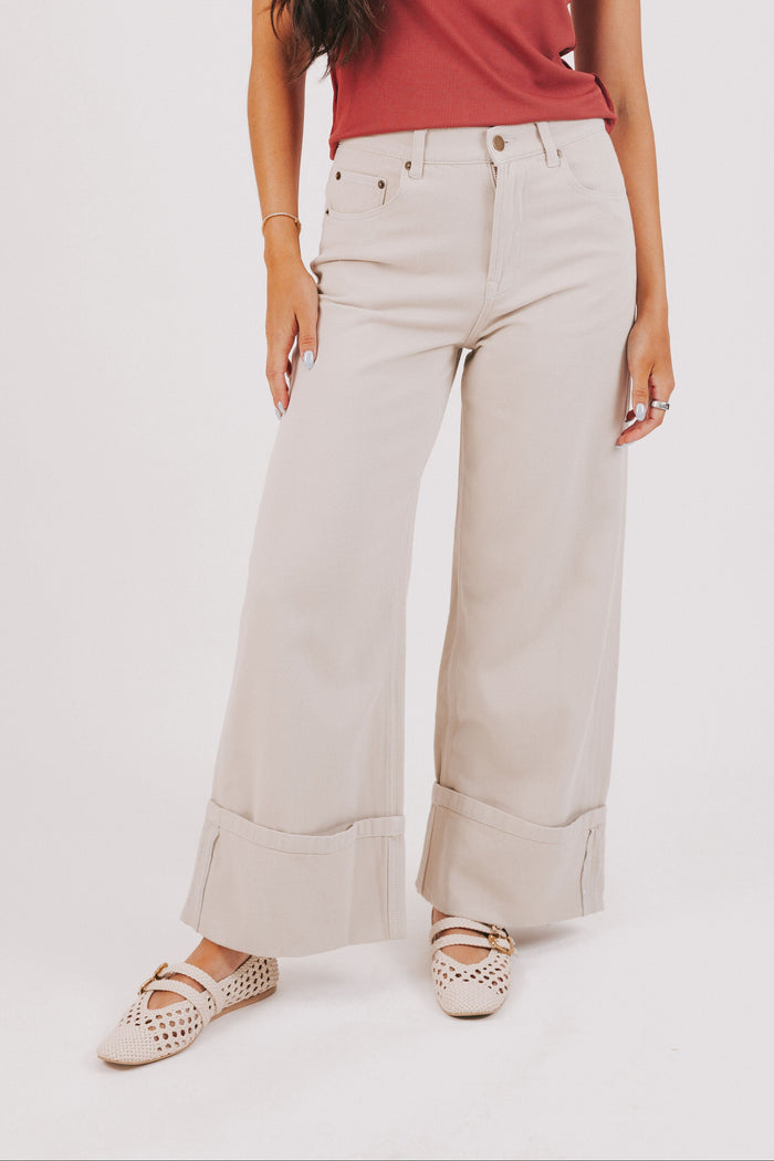 beige wide leg jeans with wide cuff front