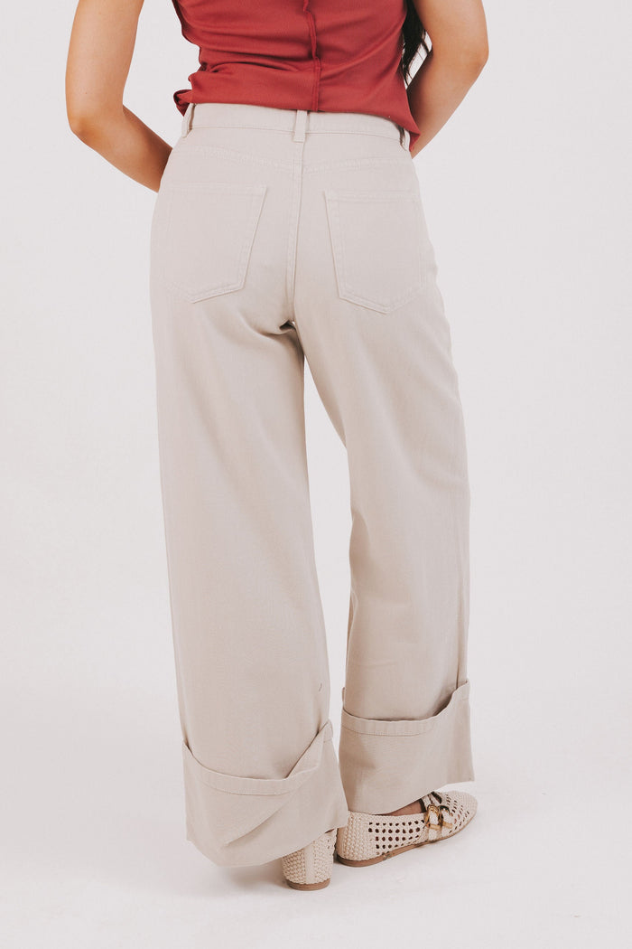 beige wide leg jeans with wide cuff back