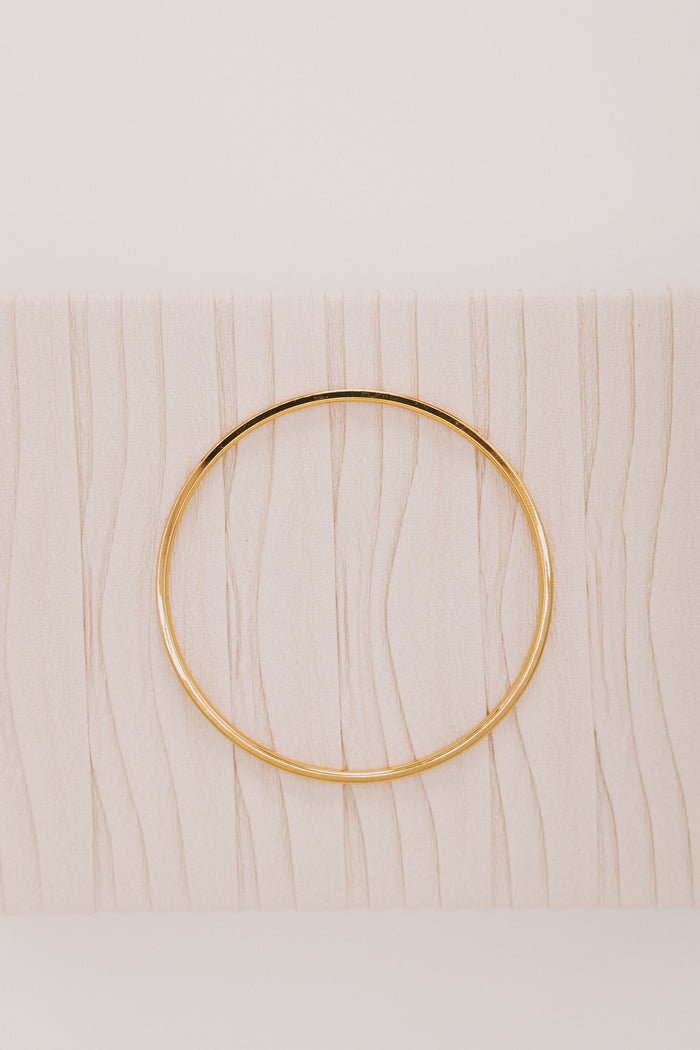 gold bangle with stone detail
