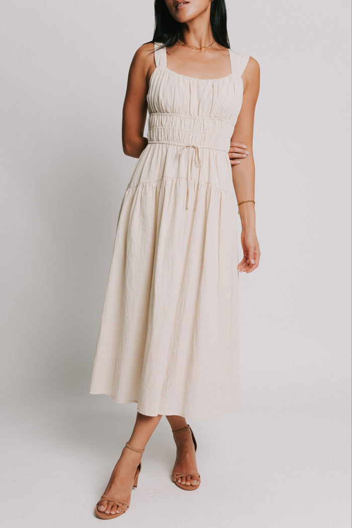 sleeveless-cream-midi-dress-with-gathered-bodice