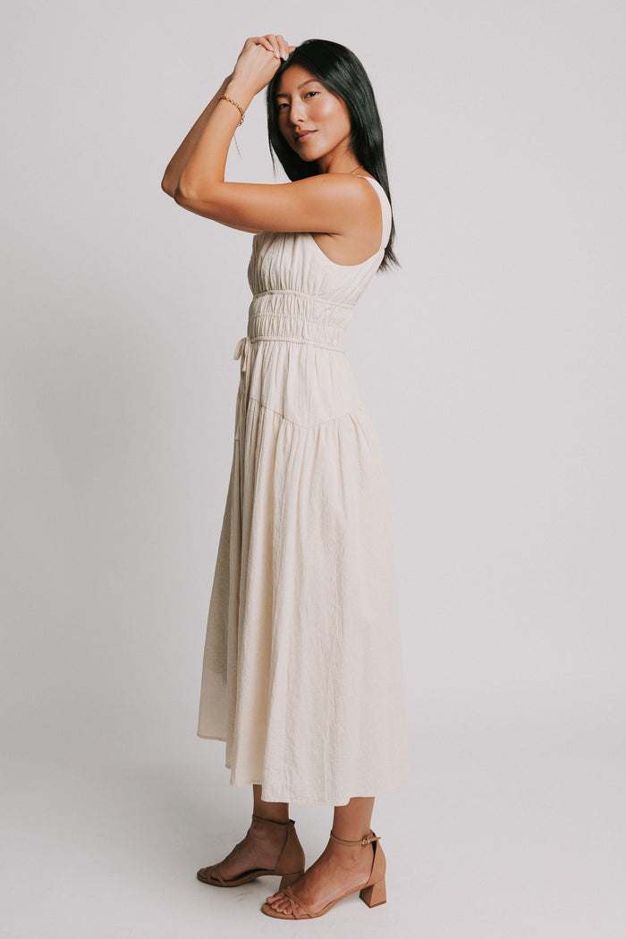sleeveless-cream-midi-dress-with-gathered-bodice-side