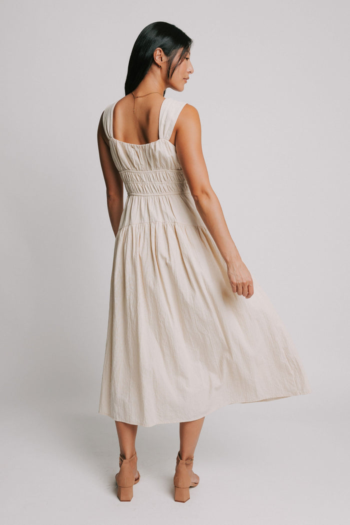 sleeveless cream midi dress with gathered bodice back