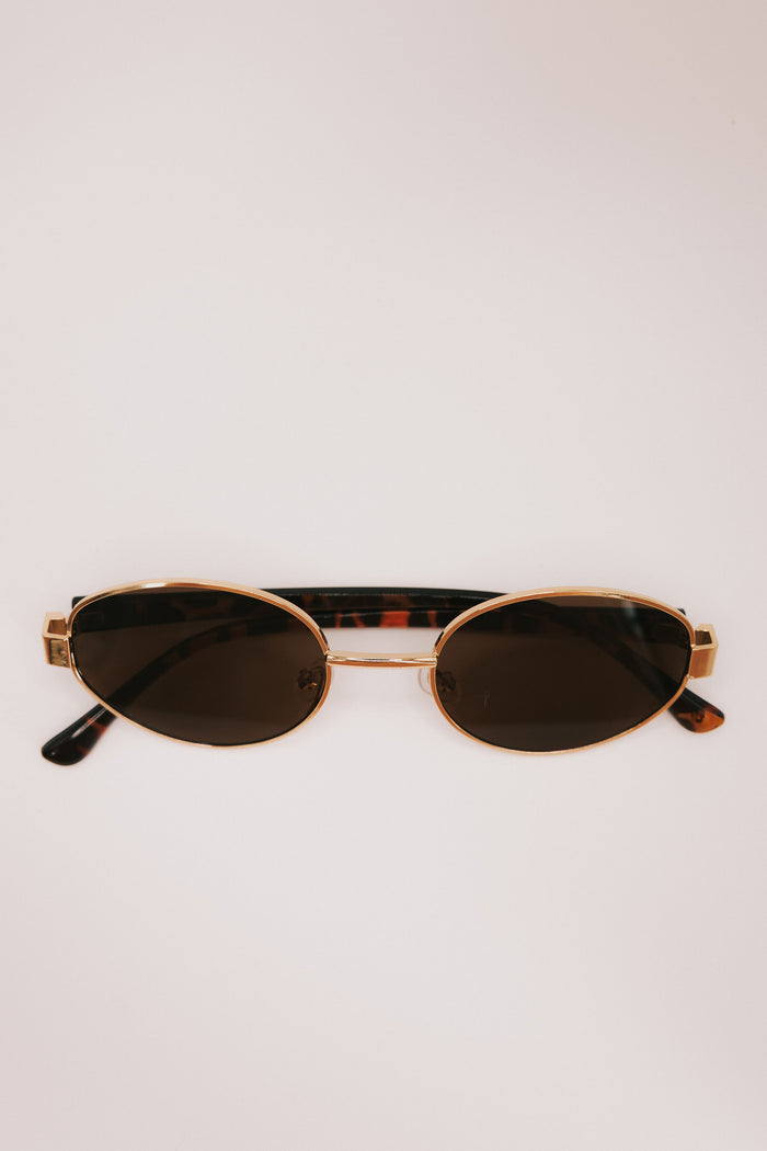 tortoiseshell gold rimmed sunglasses display 2