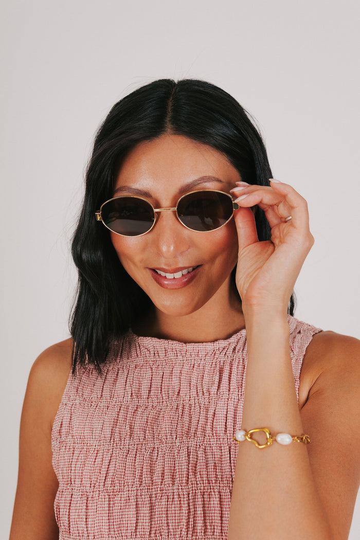 tortoiseshell gold rimmed sunglasses model 2