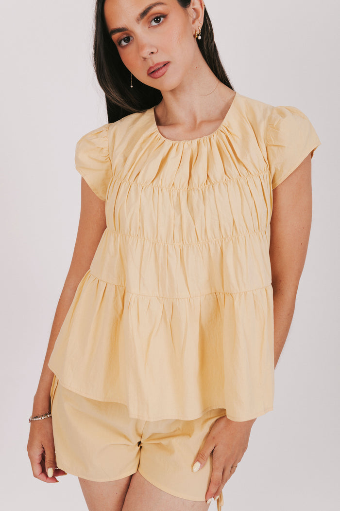 tiered yellow top