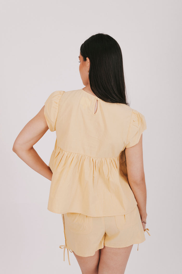 tiered yellow top