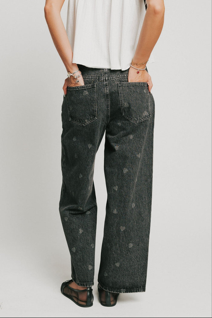washed black barrel jeans with heart print