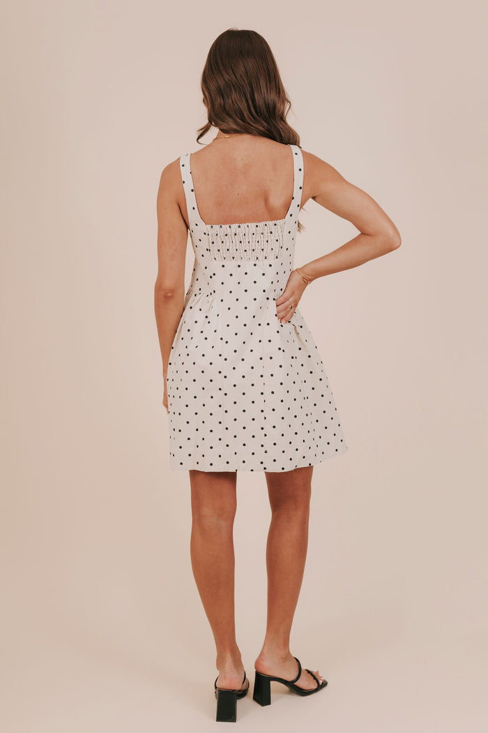 Polka dot buttons basque waist pockets lined mini dress back
